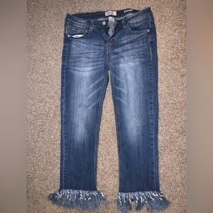 Fringe bottom jeans.